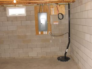 A sump pump in a basement